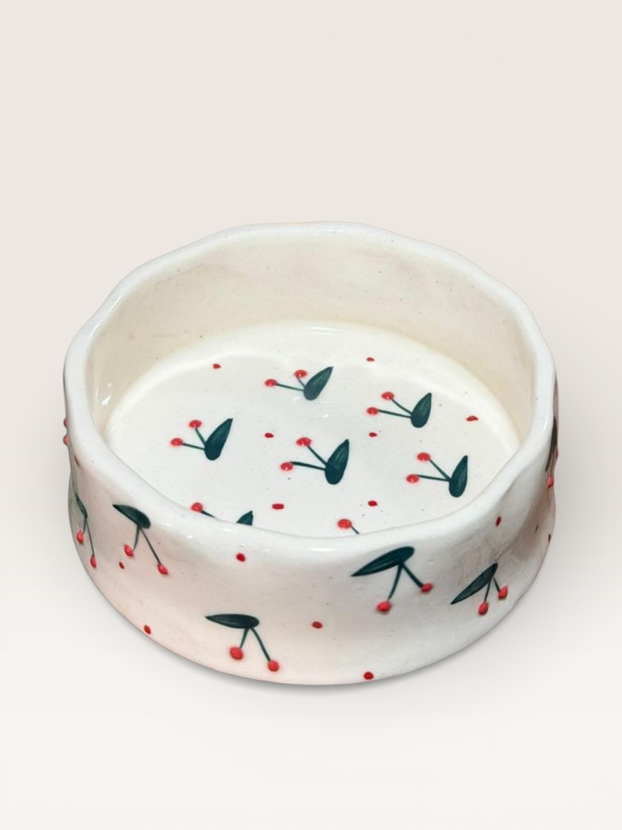 Hand-painted stoneware bowl with a cherry pattern